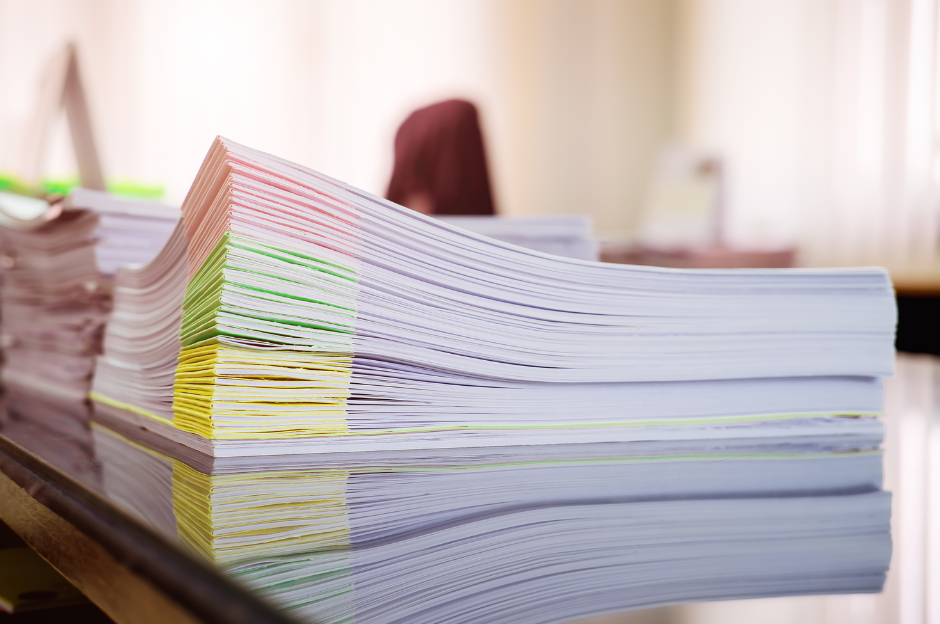 Stack of papers with coloured corners